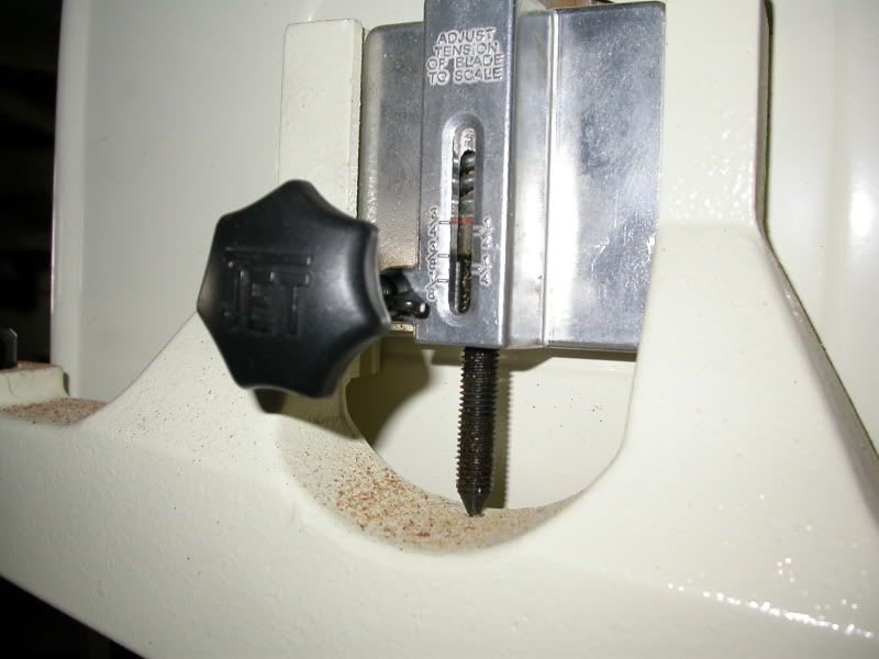 How do I interpret the tension spring on a Jet 14" bandsaw